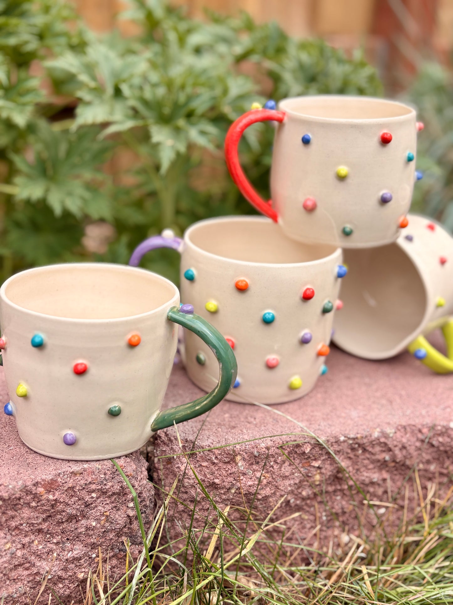 Toots Ceramics - 12 oz Porcelain Dots Mug (Green/Purple Handle)
