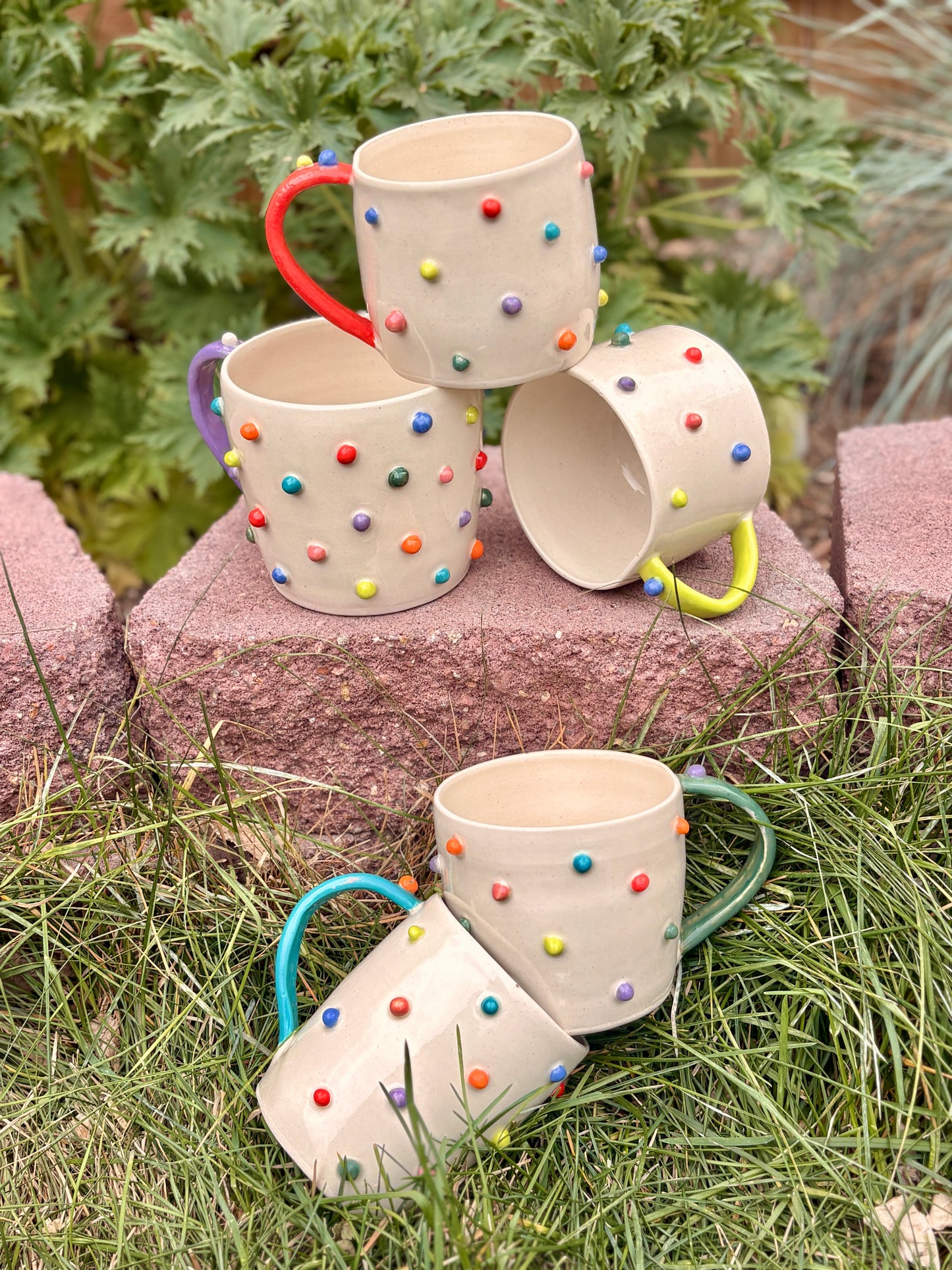 Toots Ceramics - 10 oz Porcelain Dots Mug (Red/Blue/Green Handle)