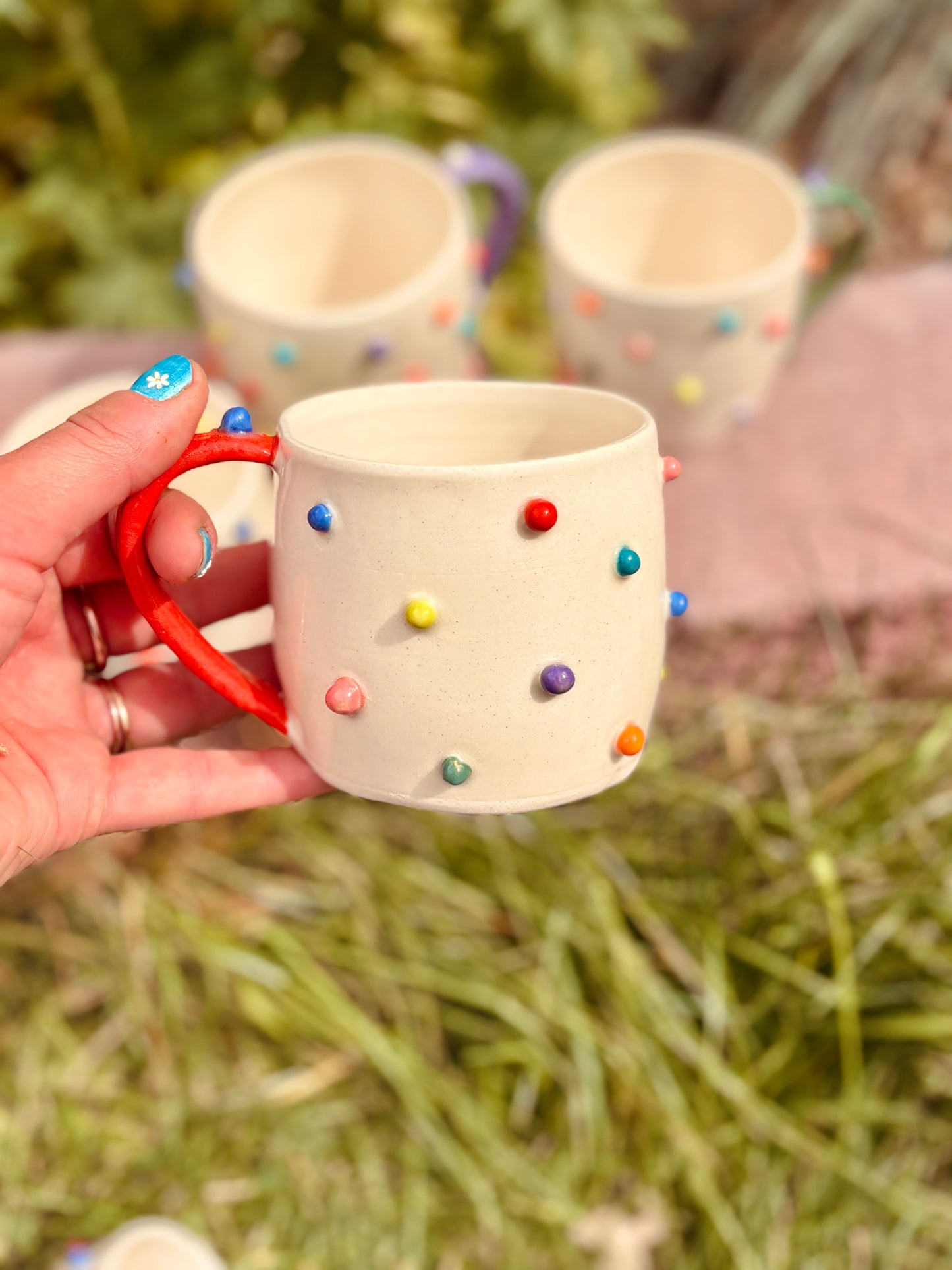 Toots Ceramics - 10 oz Porcelain Dots Mug (Red/Blue/Green Handle)