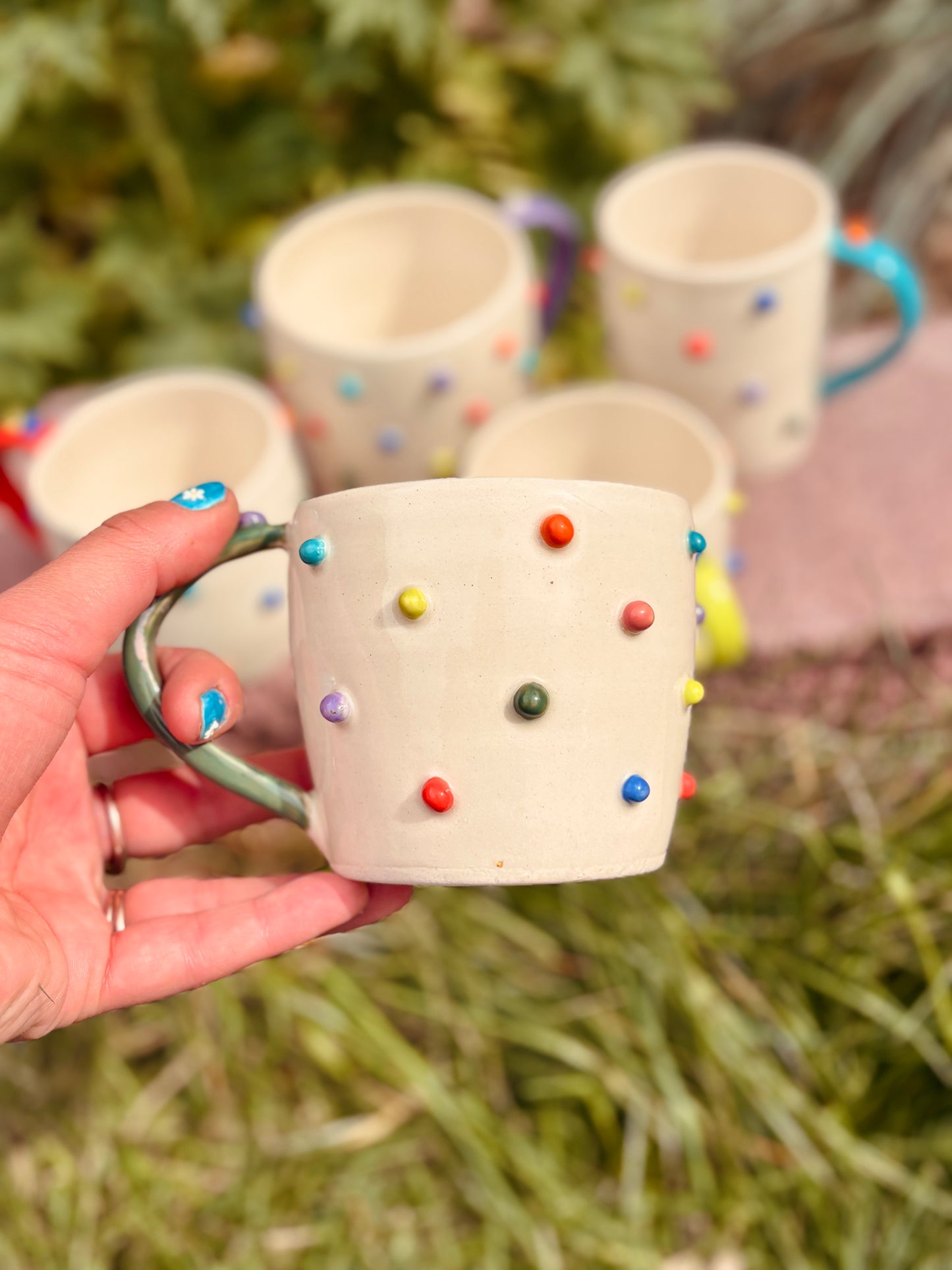 Toots Ceramics - 12 oz Porcelain Dots Mug (Green/Purple Handle)